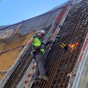 Charles Climbing a Rebar Structure at NW WWTP